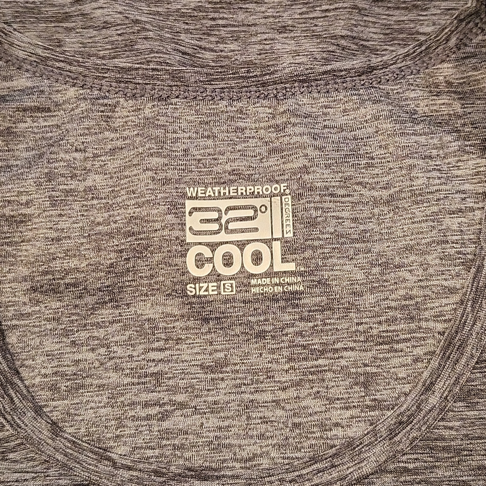 Weatherproof, stretchy short sleeve shirt. 25" long.